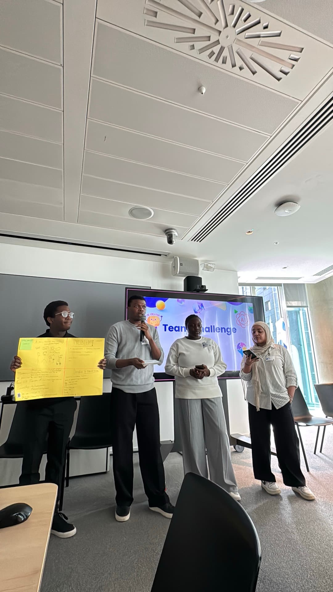Members presenting their ideas during the team challenge at the Microsoft Insight Day